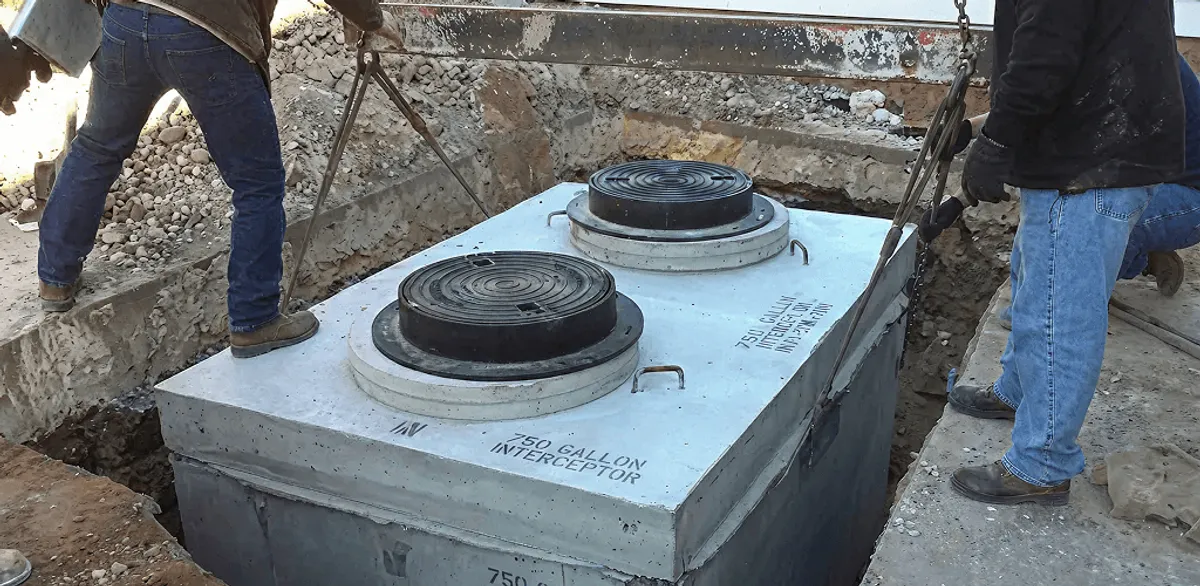 Grease trap installation for a commercial property drainage system in Fargo, ND